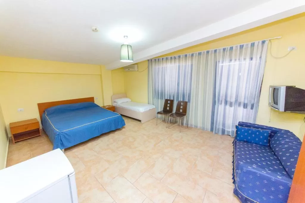 Kolaveri Resort - main bldg TRPL room-1.jpg